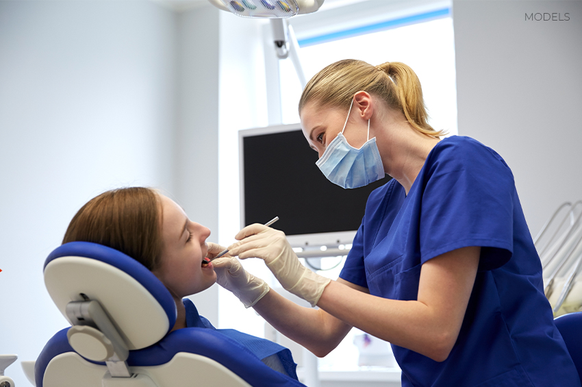 When can I brush my teeth after wisdom teeth removal